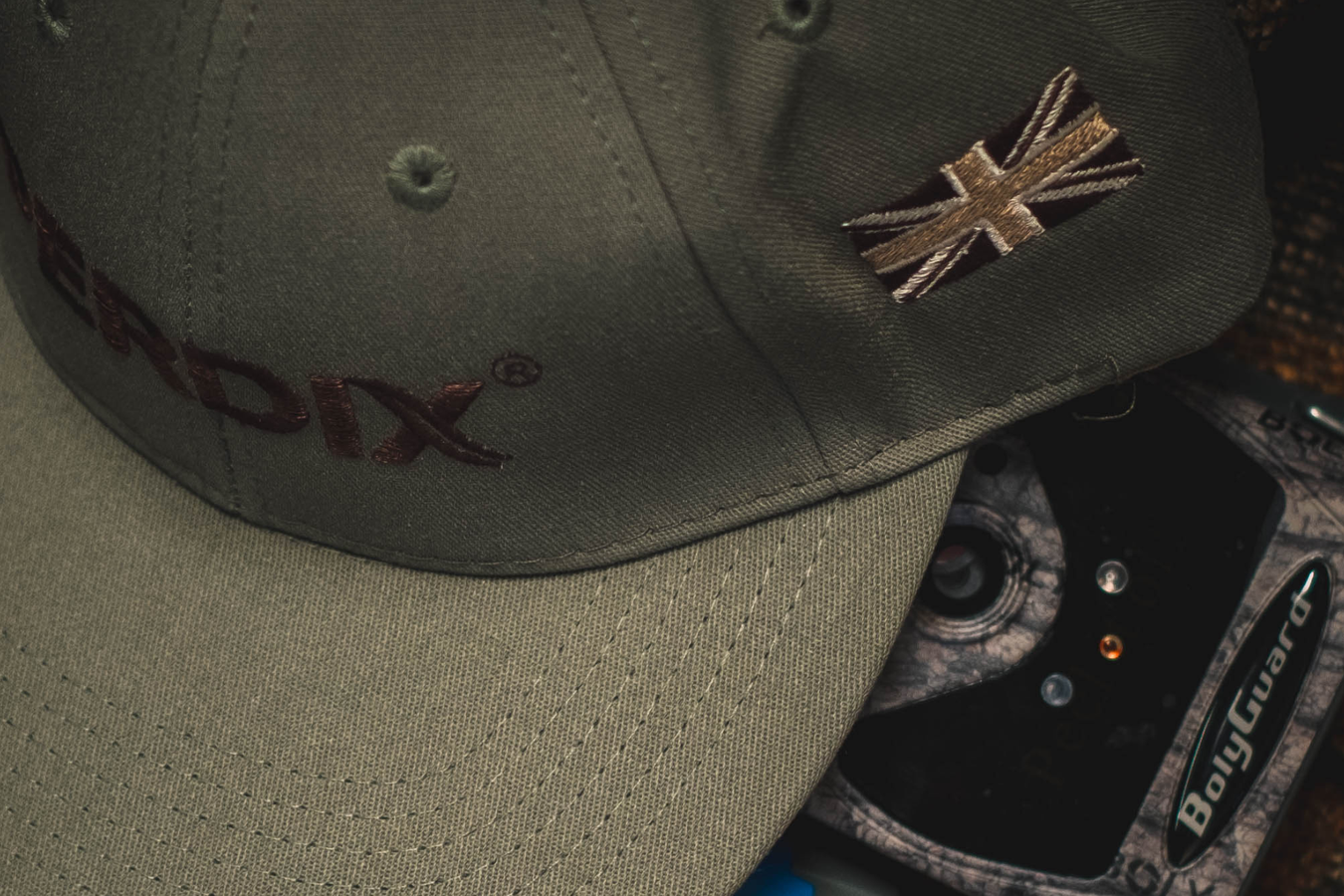 PERDIX branded baseball caps. High quality made in the USA caps with PERDIX logo and Union Jack - Show fellow wildlife professionals you use a quality outfitter for your wildlife equipment.