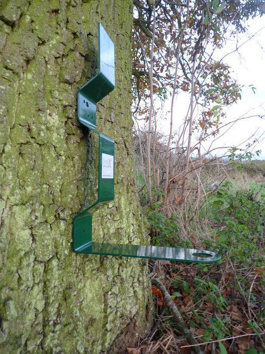 PERDIX Farmland Feeder Post mount on a tree. This post mount has been specifically designed to allow the PERDIX Farmland Bird Feeder or the PERDIX Game Bird Feeder to be quickly, easily and securely attached to any fence post or tree.