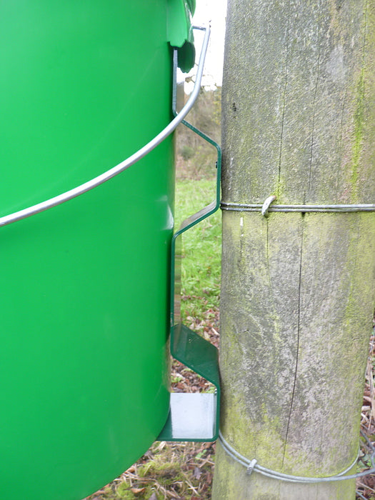 PERDIX Game Bird Spiral Feeder mounted on farm fence post using post mount